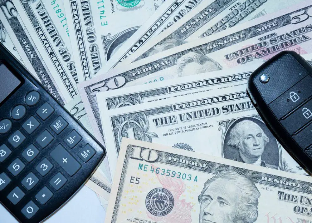 free-photo-of-car-keys-and-canculator-on-the-photo-of-money-calculate-the-cost-of-a-car-trip-2b2823870c37bec67c6c20af813c7f3c-7f106a7f504a4105805df945ab00d48d
